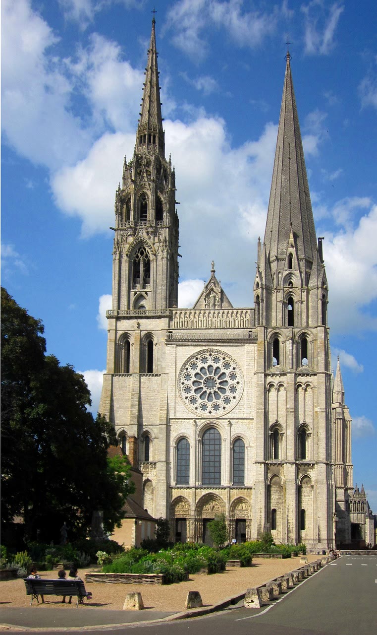 The cathedral facade and its two mismatched spires