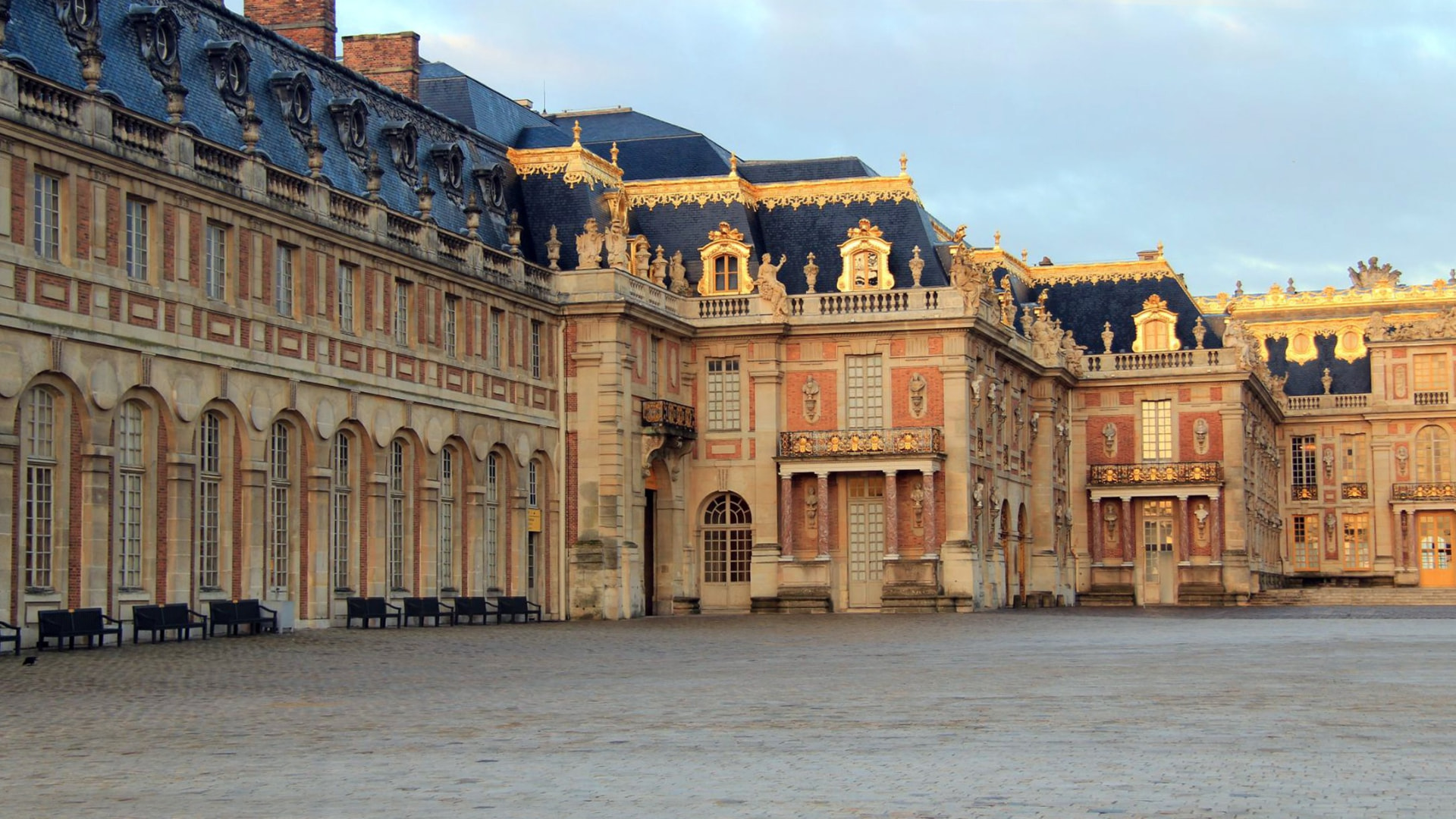 The palace facade in early golden light