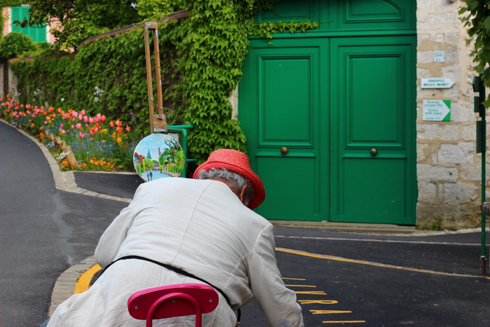 A painter at work outside the gates of Giverny